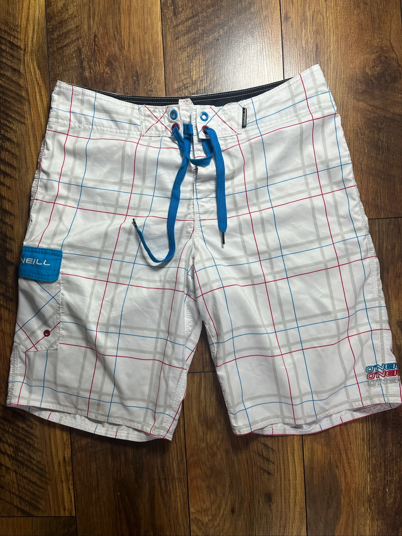 Boardshort rayures rouge/noir grand logo rond Style urban surf - O’neill - Taille S - très bon état